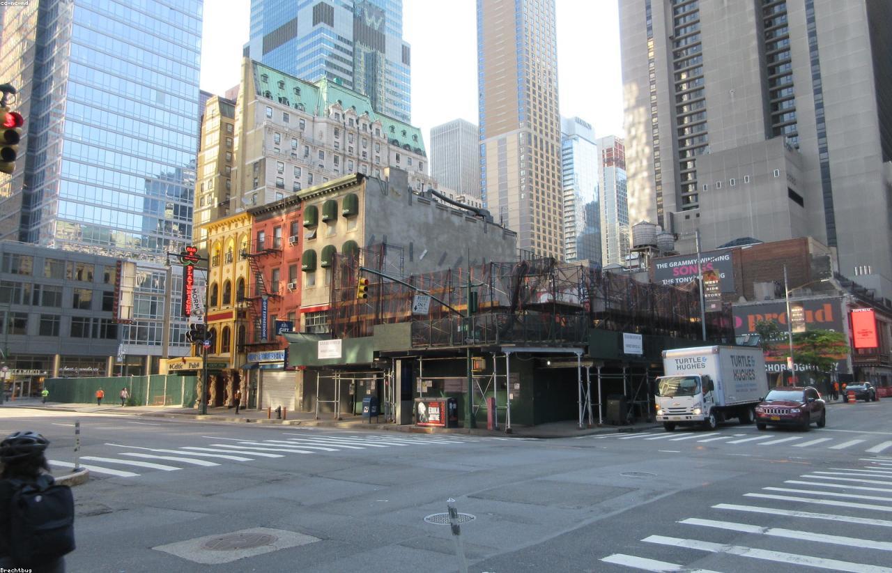 Corporate traveler working in a city business district