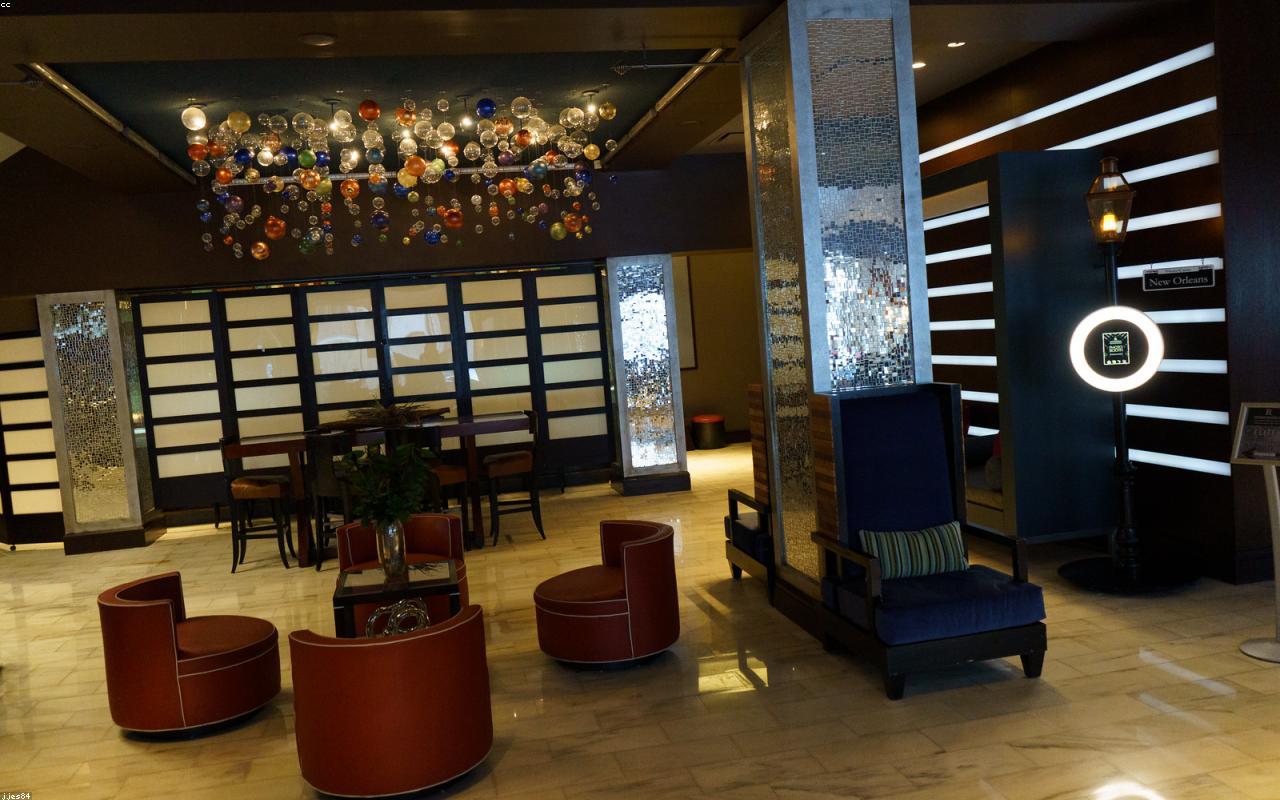 Long-term traveler checking in at a business hotel lobby